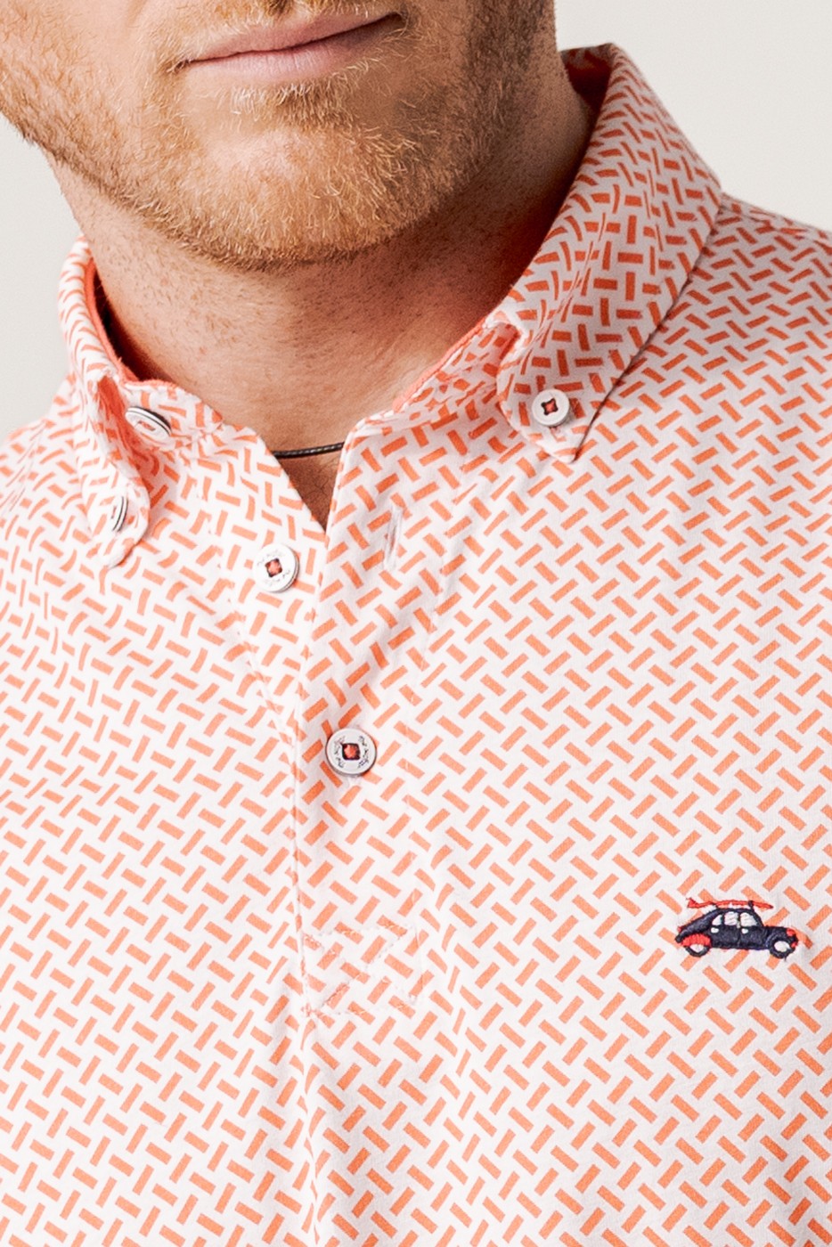 Polo manga corta estampado abstracto rayas coral